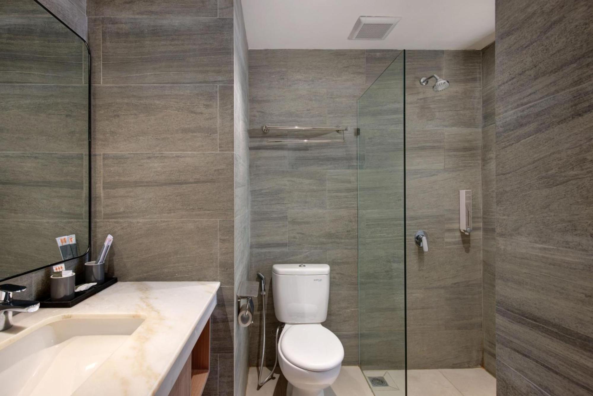 Harper Kupang By Aston Hotel Room photo
